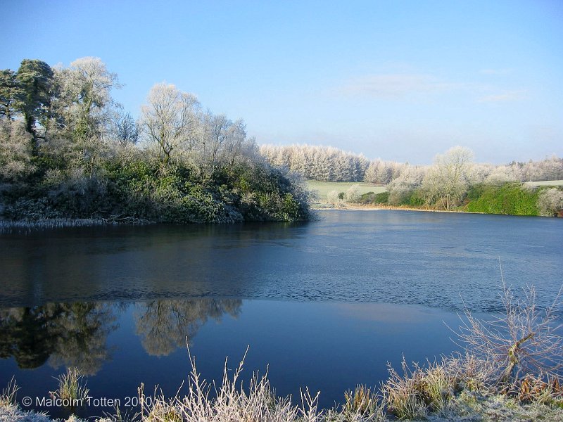 21. Rossmore in winter - Ice on the castle lake..jpg